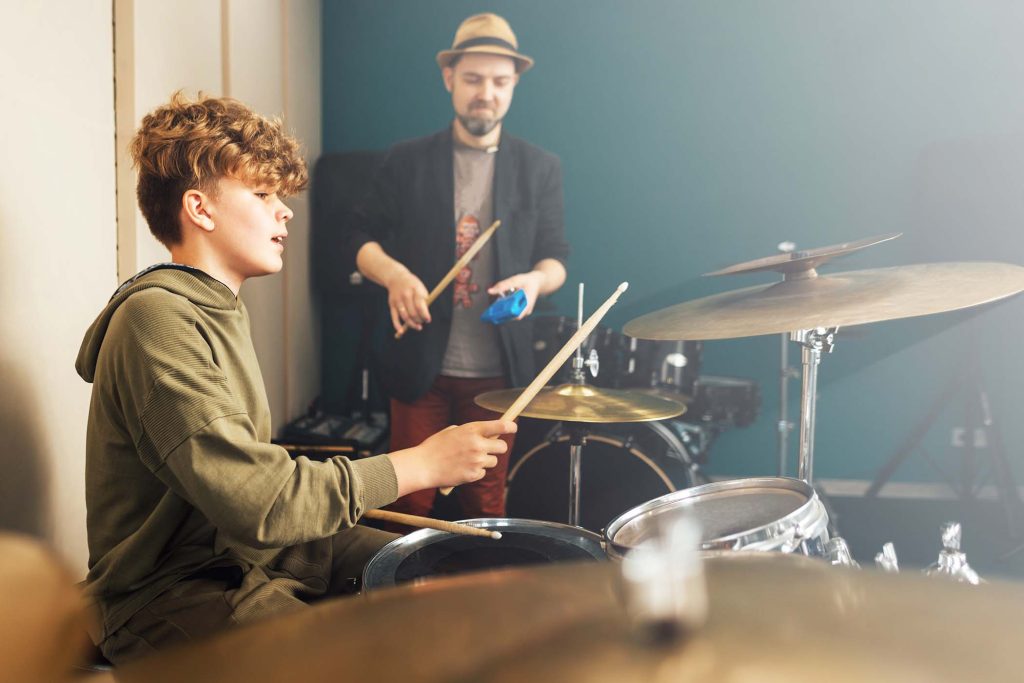 Drum lesson at music school.