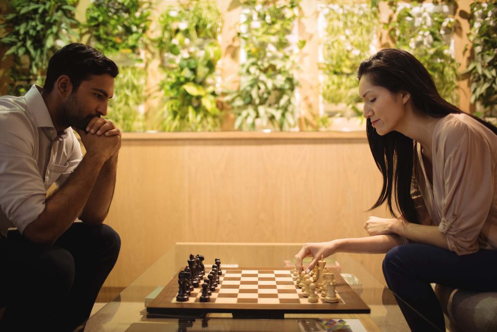 business-colleagues-playing-chess-NXKSR3R