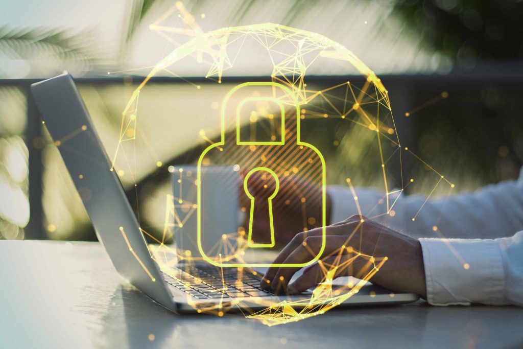 close-up-of-businessman-hands-using-laptop-with-ab-S2LQSC2