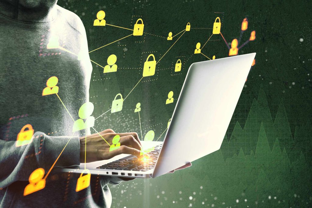 side-view-of-hacker-using-laptop-with-forex-chart-BSA9QUN