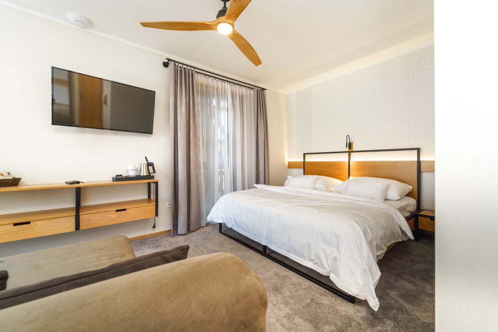 An interior of modern bedroom suite in luxury hotel