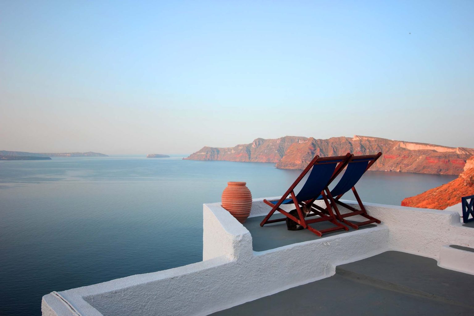 sunbeds with Seascape of Santorini